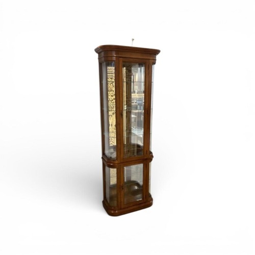 Used Pulaski Illuminated Curved Oak Curio Cabinet for sale on AptDeco