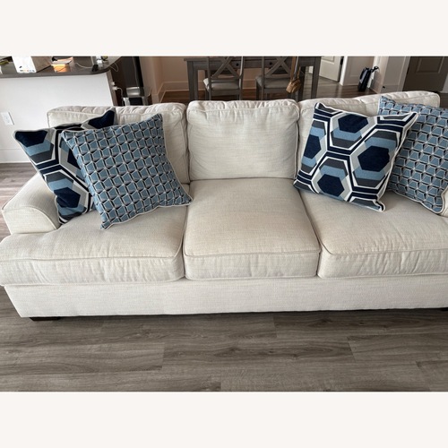 Used Rooms To Go  White Fabric 3+ Piece Sectional for sale on AptDeco