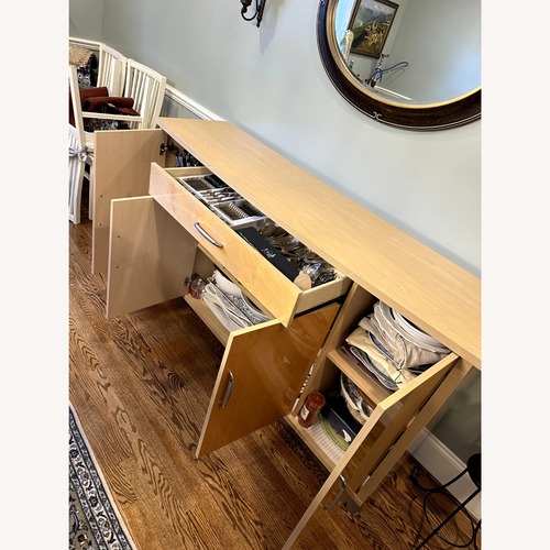 Used Vintage/Antique Natural Wood Sideboard for sale on AptDeco