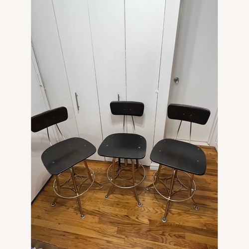 Used Restoration Hardware Dark Brown Wood Stools for sale on AptDeco