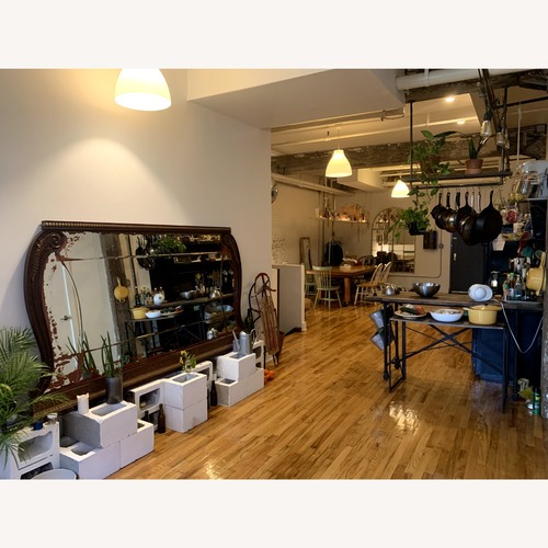 Used Vintage/Antique Dark Brown Wood Wall Mirror for sale on AptDeco