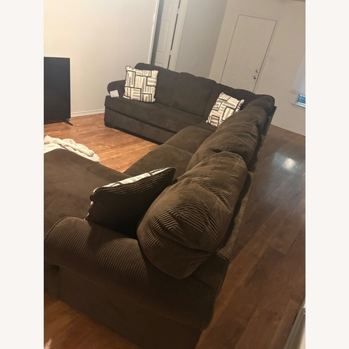 Used Ashley Furniture Dark Brown 3+ Piece Sectional for sale on AptDeco