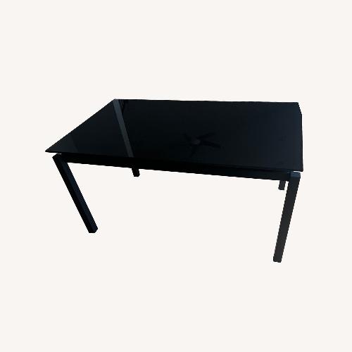 Used Black Glass Dining Table for sale on AptDeco
