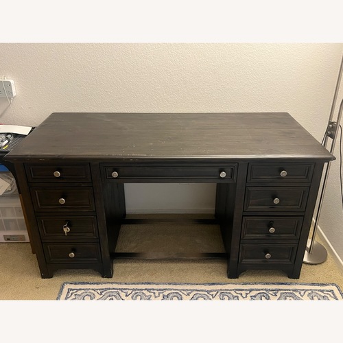 Used Dark Brown Wood Desk for sale on AptDeco