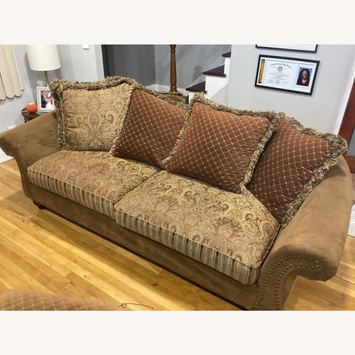 Used Raymour & Flanigan Dark Brown 2 Seater Sofa for sale on AptDeco