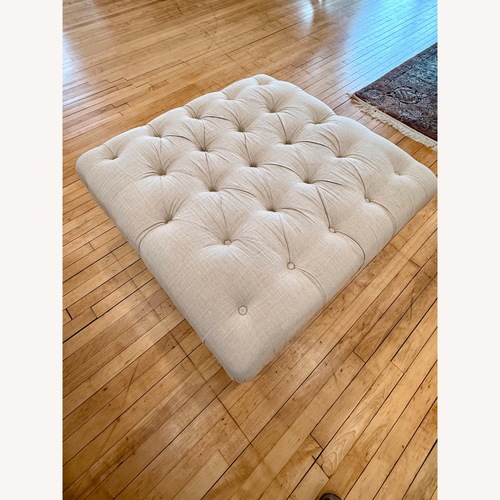 Used Linen Sandstone Tufted Ottoman for sale on AptDeco