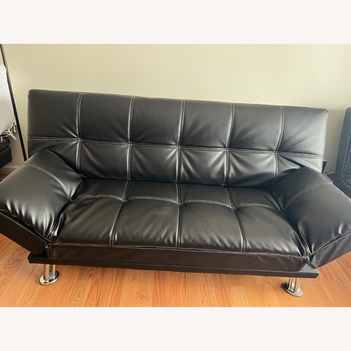 Used Hauser Black Futon for sale on AptDeco