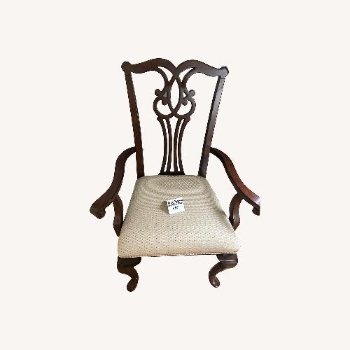 Used Vintage/Antique Dark Brown Wood Armchair for sale on AptDeco