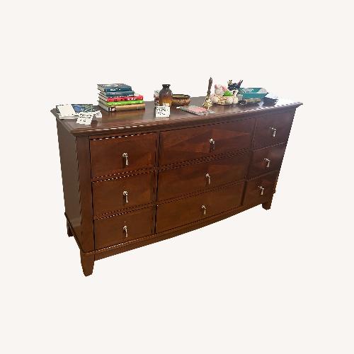 Used Vintage/Antique Dark Brown Wood Dresser for sale on AptDeco