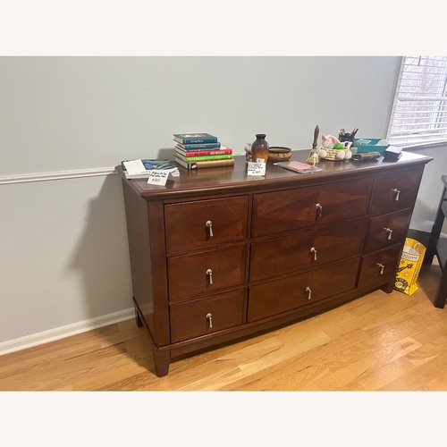 Used Vintage/Antique Dark Brown Wood Dresser for sale on AptDeco