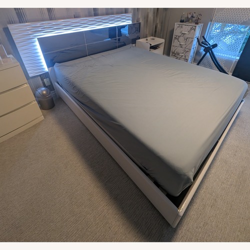 Used Manhattan White Mirrored Queen Platform Bed for sale on AptDeco