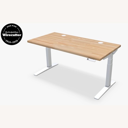 Used Uplift V2 Standing Desk White Wood Desk for sale on AptDeco