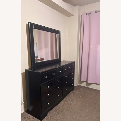 Used Ashley Furniture Black Dresser for sale on AptDeco