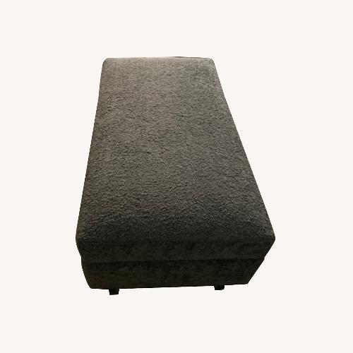 Used CISCO Brothers Dark Gray Ottoman for sale on AptDeco
