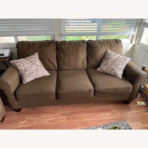 Used Ashley Furniture Dark Brown Sleeper Sofa for sale on AptDeco