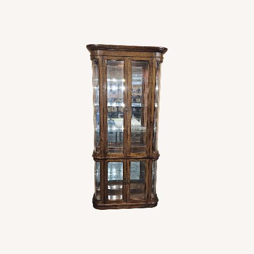 Used Pulaski Hardwood Curved Glass Mirror Curio Cabinet for sale on AptDeco