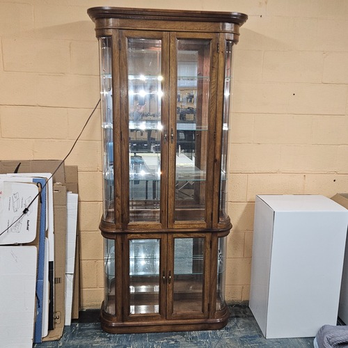 Used Pulaski Hardwood Curved Glass Mirror Curio Cabinet for sale on AptDeco
