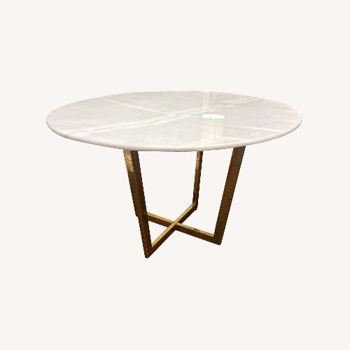 Used Bed Bath & Beyond White Marble Dining Table for sale on AptDeco