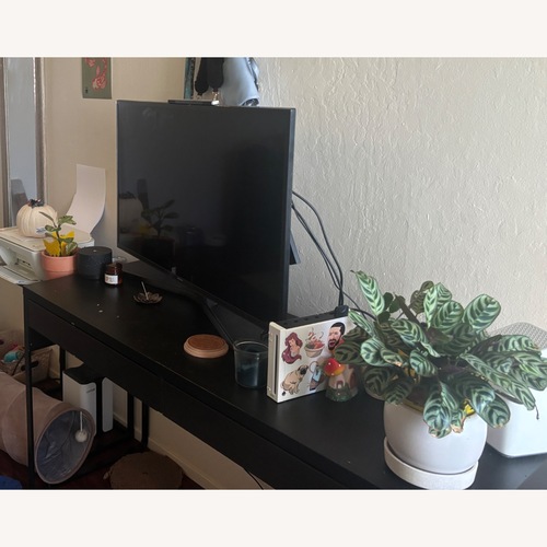 Used Dark Brown TV Stand for sale on AptDeco