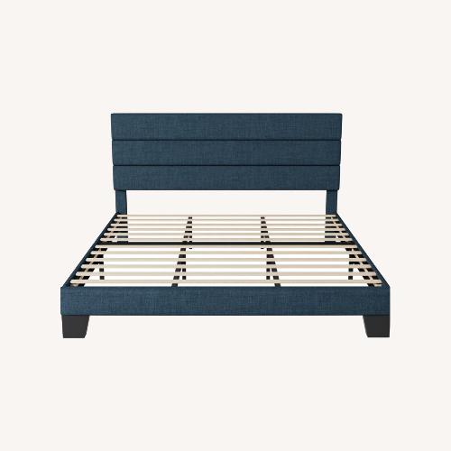Used Amazon Blue Wood King Bed for sale on AptDeco
