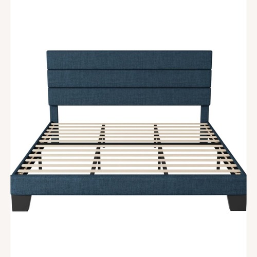 Used Amazon Blue Wood King Bed for sale on AptDeco
