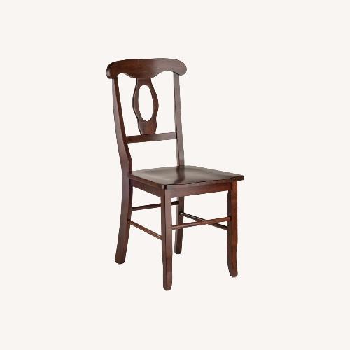 Used Pair of Dark Brown Wood Dining Chairs for sale on AptDeco