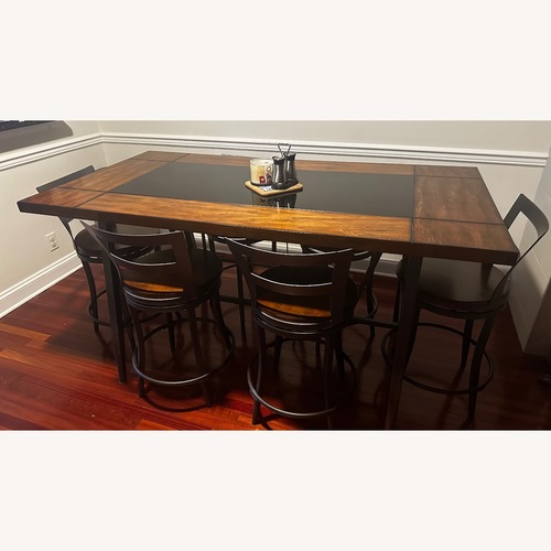 Used The Brick Wood Dining Set for sale on AptDeco