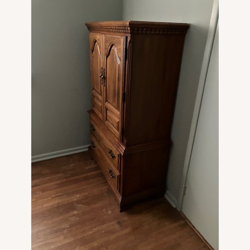 Used Vintage/Antique Dark Brown Wood Queen Bed for sale on AptDeco