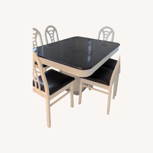 Used Granite Kitchen/Dining Table Set with 6 Chairs for sale on AptDeco