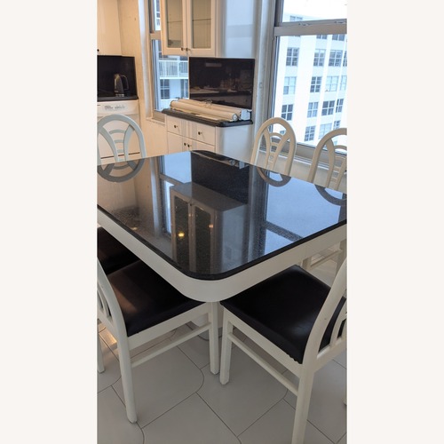 Used Granite Kitchen/Dining Table Set with 6 Chairs for sale on AptDeco