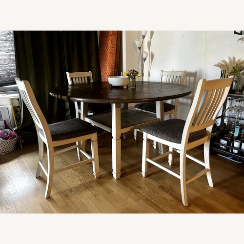 Used Ashley Furniture Natural Wood Dining Set for sale on AptDeco