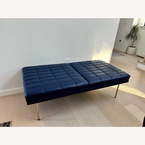 Used Herman Miller Tuxedo Blue Faux Leather Ottoman for sale on AptDeco