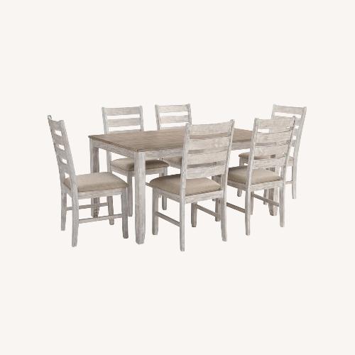 Used Ashley Furniture 7 Piece Dining Table and Chairs Set for sale on AptDeco