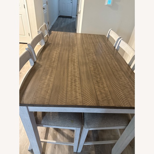 Used Ashley Furniture 7 Piece Dining Table and Chairs Set for sale on AptDeco