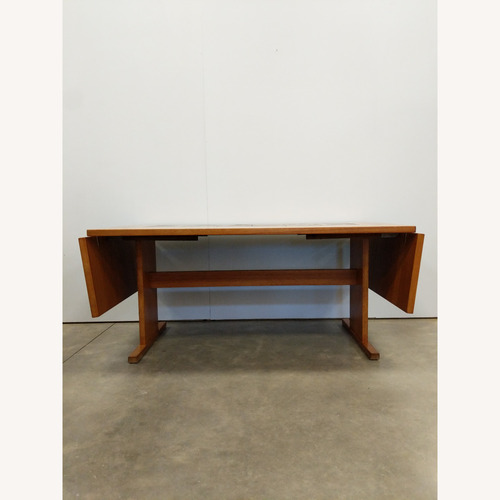 Used Vintage Danish Modern Teak Extendable Dining Table for sale on AptDeco