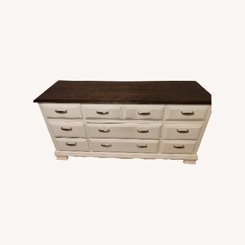 Used Vintage/Antique Dark Brown Wood Top Dresser for sale on AptDeco