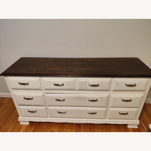 Used Vintage/Antique Dark Brown Wood Top Dresser for sale on AptDeco