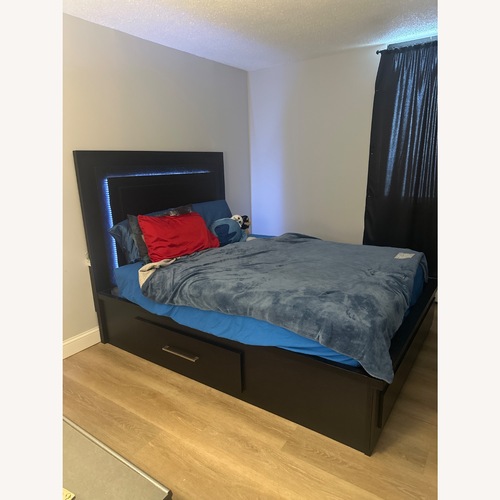 Used Bob's Discount Furniture Black Wood Queen Bed for sale on AptDeco