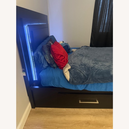 Used Bob's Discount Furniture Black Wood Queen Bed for sale on AptDeco