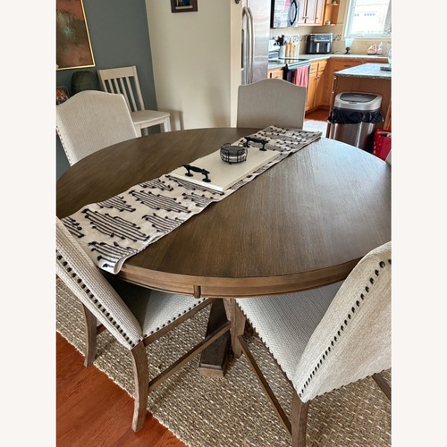 Used Ashley Furniture Dark Gray Wood Dining Sets for sale on AptDeco
