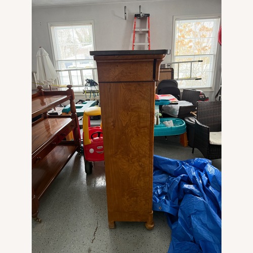 Used Vintage/Antique Light Brown Wood Armoire for sale on AptDeco
