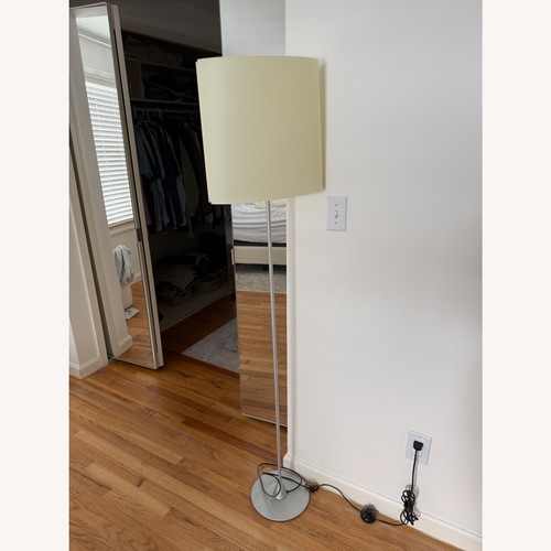 Used Luceplan Costanza Natural Metal Floor Lamp for sale on AptDeco