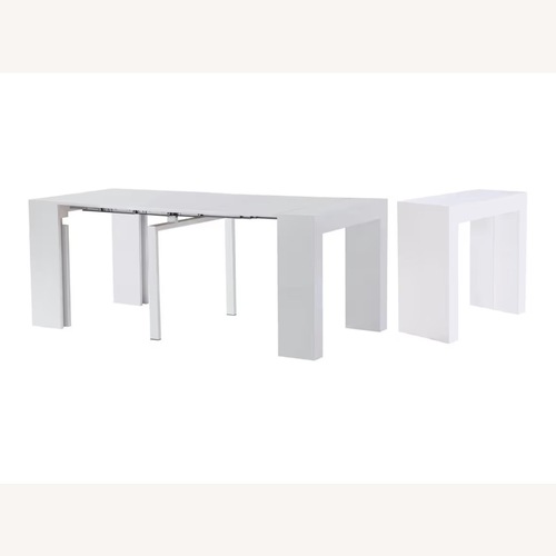 Used Maxmindecor White Lacquer Dining Table for sale on AptDeco