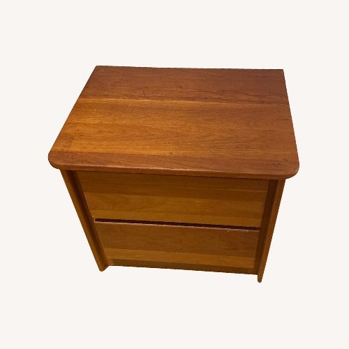 Used  Cherry Wood Nightstand with Two Drawers for sale on AptDeco