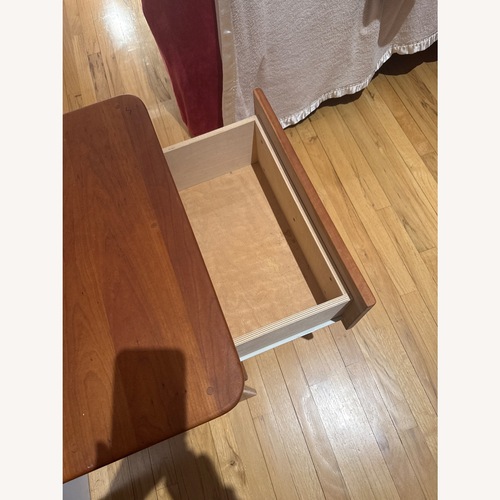 Used  Cherry Wood Nightstand with Two Drawers for sale on AptDeco