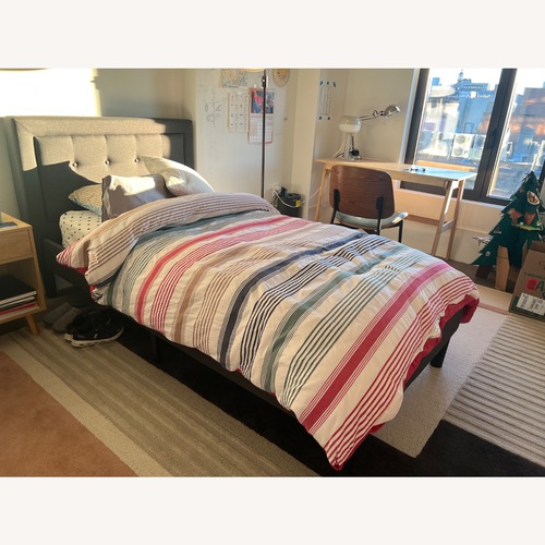 Used Dark Gray Fabric Twin Bed for sale on AptDeco