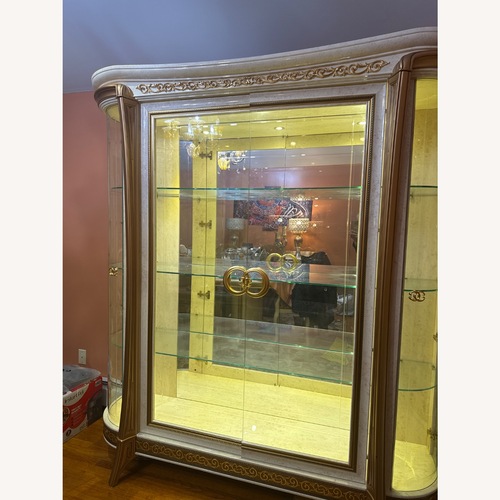 Used Arredo Classice Made In Itlay Gold Glass Armoire for sale on AptDeco