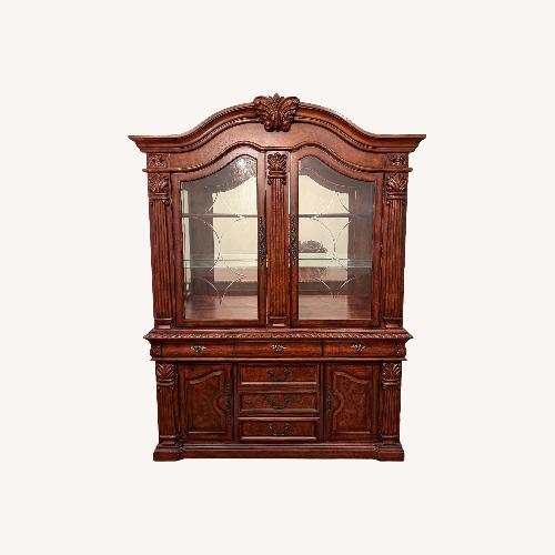 Used Ashley Wood China Cabinet Display Hutch with Lights for sale on AptDeco