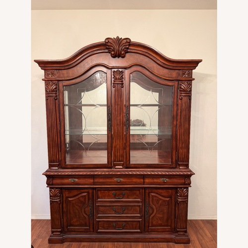 Used Ashley Wood China Cabinet Display Hutch with Lights for sale on AptDeco