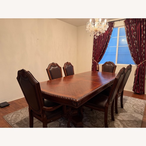 Used Ashley Furniture Light Brown Wood Dining Set for sale on AptDeco